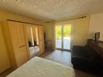 Un ou plusieurs lits dans un hébergement de l'établissement Appartements Calvi