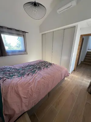 Un ou plusieurs lits dans un hébergement de l'établissement Petite villa cocooning