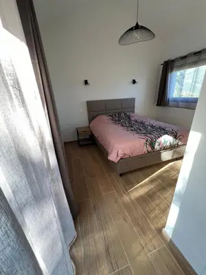 Un ou plusieurs lits dans un hébergement de l'établissement Petite villa cocooning