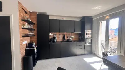Cuisine ou kitchenette dans l'établissement Appartement Le Millie 3 chambres Hyper centre