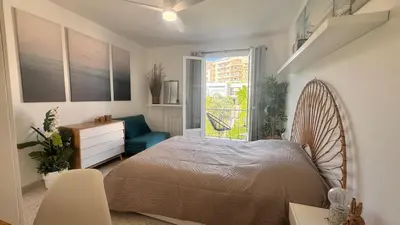 Un ou plusieurs lits dans un hébergement de l'établissement Appartement Le Millie 3 chambres Hyper centre
