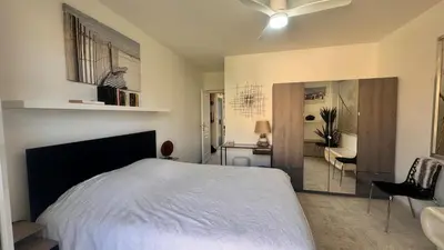 Un ou plusieurs lits dans un hébergement de l'établissement Appartement Le Millie 3 chambres Hyper centre