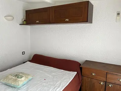 Un ou plusieurs lits dans un hébergement de l'établissement Maisonnette privé bord de mer Poggio mezzana