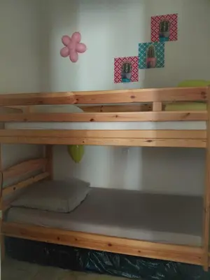 Un ou plusieurs lits superposés dans un hébergement de l'établissement Appartement 4 pièces dans une petite résidence calme, climatisation et piscine