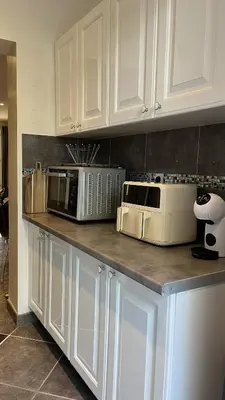 Cuisine ou kitchenette dans l'établissement La villa Emmagathe