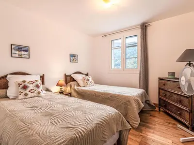 Un ou plusieurs lits dans un hébergement de l'établissement Maison entre mer et montagne