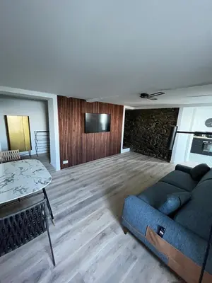 Coin salon dans l'établissement Studio dans maison typique du cap Corse