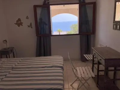 Un ou plusieurs lits dans un hébergement de l'établissement Cap Corse Vue Mer 3km de Bastia