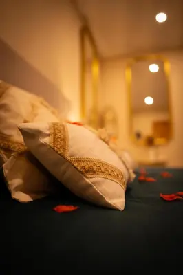 Un ou plusieurs lits dans un hébergement de l'établissement A Stalla di i Sensi - Chambre romantique avec spa
