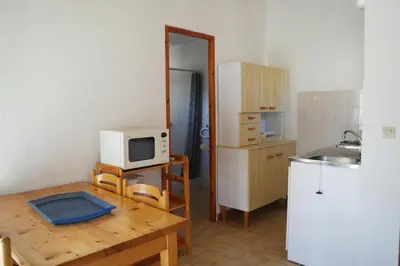 Cuisine ou kitchenette dans l'établissement Residence Thalassa