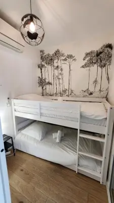 Un ou plusieurs lits dans un hébergement de l'établissement Appartement Calvi, Cœur de ville, plage à 300 m
