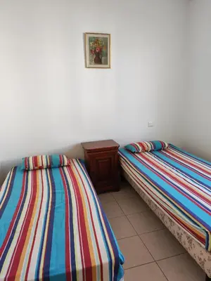 Un ou plusieurs lits dans un hébergement de l'établissement Casa Helena
