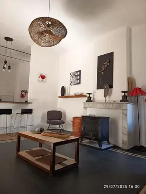 Cuisine ou kitchenette dans l'établissement La maison du bonheur