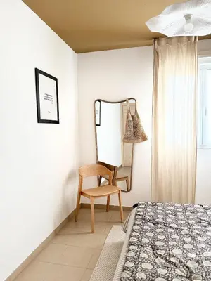 Un ou plusieurs lits dans un hébergement de l'établissement Appartement 2 CHAMBRES PISCINE TERRASSE SAINT FLORENT