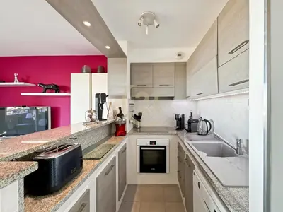Cuisine ou kitchenette dans l'établissement Vue mer - T2 sur les hauteurs de L'Île-Rousse