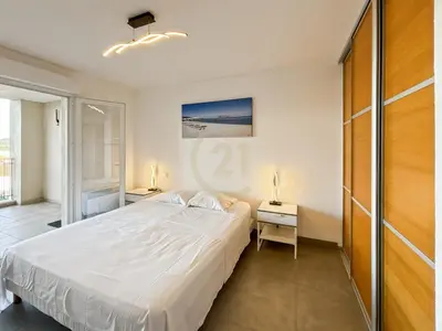 Un ou plusieurs lits dans un hébergement de l'établissement Résidence Le Clos des Oliviers T2 - Vue mer