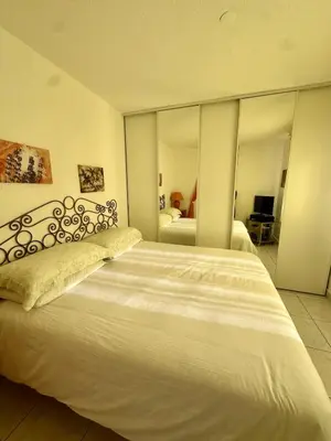 Un ou plusieurs lits dans un hébergement de l'établissement Apartment 2 steps from Ile-Rousse Beach