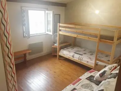 Un ou plusieurs lits dans un hébergement de l'établissement Pavillon au bord de la mer