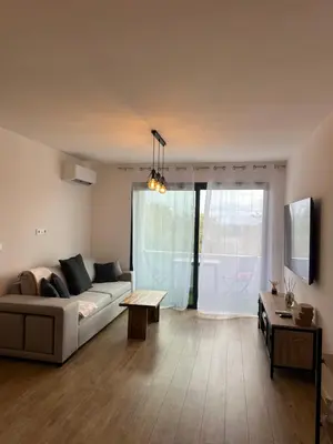Coin salon dans l'établissement Appartement T2 calme et paisible Vescovato