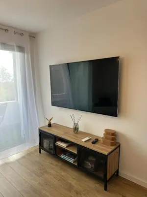 Télévision ou salle de divertissement dans l'établissement Appartement T2 calme et paisible Vescovato