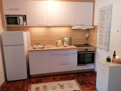 Cuisine ou kitchenette dans l'établissement Marine de Sant Ambroggio-Haute-Corse-bel appartement vue mer - 3 min de la plage