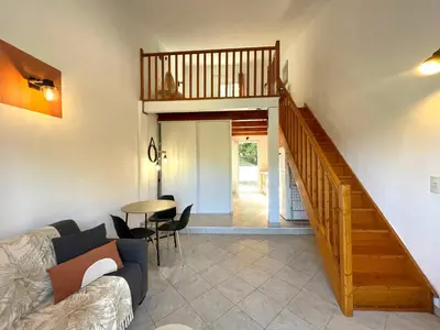 Coin salon dans l'établissement Charmant Duplex à la campagne