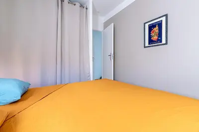 Un ou plusieurs lits dans un hébergement de l'établissement L'Appartement Cinto - Proche de L'île Rousse