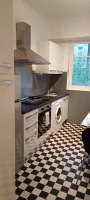 Cuisine ou kitchenette dans l'établissement Immeuble Imperial