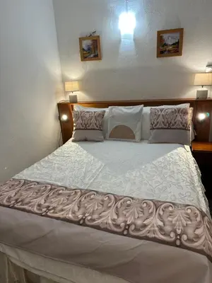 Un ou plusieurs lits dans un hébergement de l'établissement Casa Bella Centre de Corsica