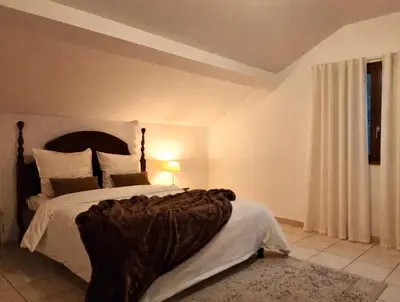 Un ou plusieurs lits dans un hébergement de l'établissement Appartement charmant - Entre campagne et ville