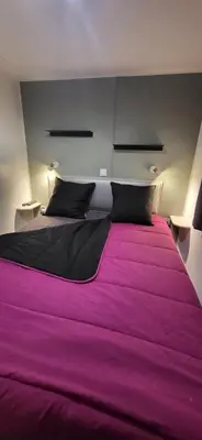 Un ou plusieurs lits dans un hébergement de l'établissement Bungalow le Sartène