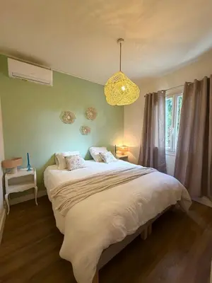 Un ou plusieurs lits dans un hébergement de l'établissement Villa San Michele 3 chambres