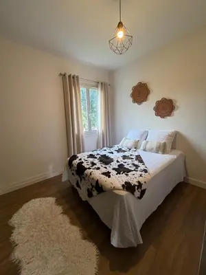 Un ou plusieurs lits dans un hébergement de l'établissement Villa San Michele 3 chambres