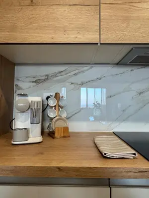 Cuisine ou kitchenette dans l'établissement Appartement vue mer et montagne