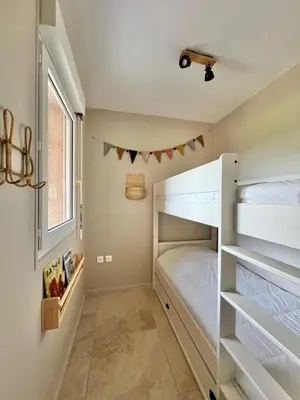 Un ou plusieurs lits dans un hébergement de l'établissement Appartement proche de la mer au coeur de la Marine