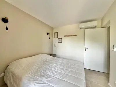 Un ou plusieurs lits dans un hébergement de l'établissement Appartement proche de la mer au coeur de la Marine