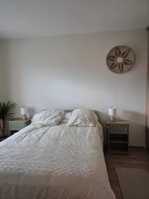 Un ou plusieurs lits dans un hébergement de l'établissement Mer et Montagne Appartement Prestigieux 7 couchages et salle de sport
