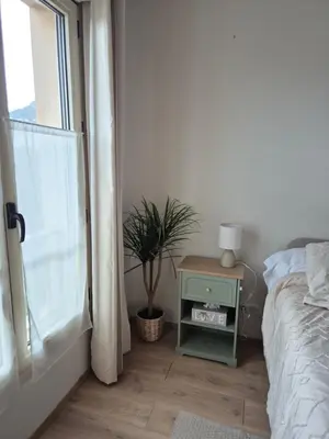 Un ou plusieurs lits dans un hébergement de l'établissement Mer et Montagne Appartement Prestigieux 7 couchages et salle de sport