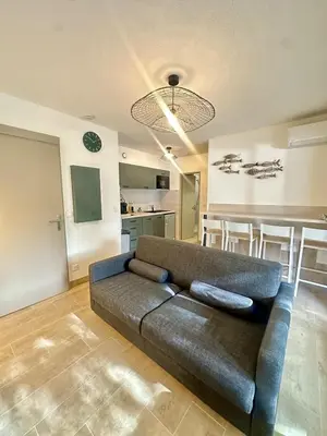 Coin salon dans l'établissement Appartement en rez de jardin-Proche du centre