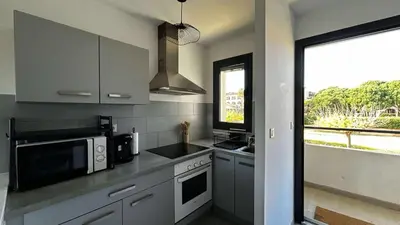 Cuisine ou kitchenette dans l'établissement Location appartement 6 pers les marines de Bravone