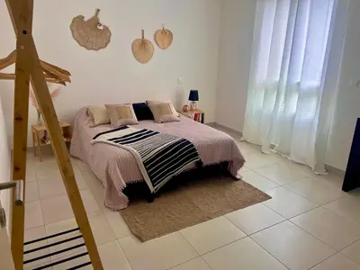 Un ou plusieurs lits dans un hébergement de l'établissement La maison des vacances