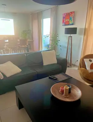 Coin salon dans l'établissement La maison des vacances