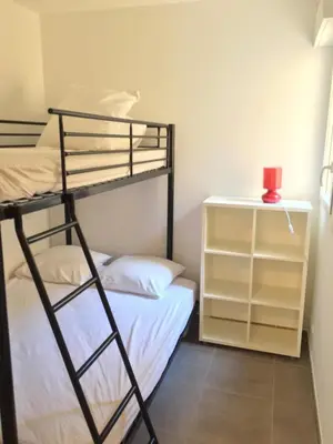 Un ou plusieurs lits dans un hébergement de l'établissement Appartement vue mer centre