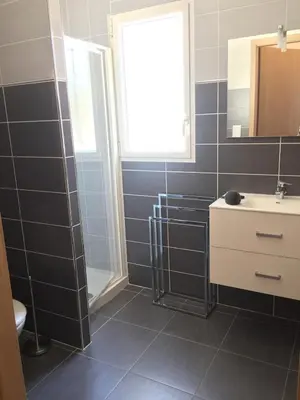 Salle de bains dans l'établissement Appartement vue mer centre