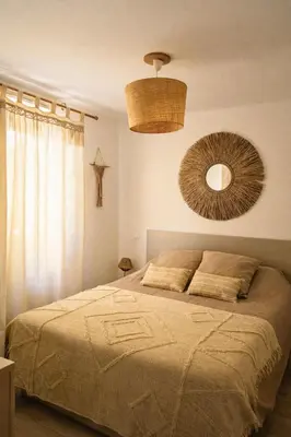 Un ou plusieurs lits dans un hébergement de l'établissement Santa-Casa-Maria, Plage & coeur de Calvi