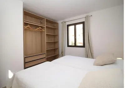 Un ou plusieurs lits dans un hébergement de l'établissement Villa familiale avec piscine,15 min des plages