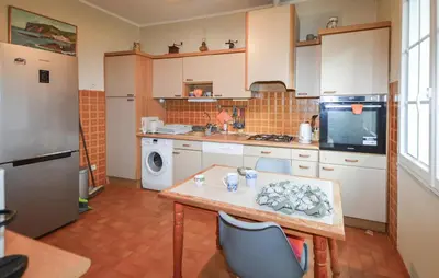 Cuisine ou kitchenette dans l'établissement Belle Maison Au Bord De La Mer