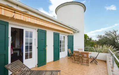 Balcon ou terrasse dans l'établissement Belle Maison Au Bord De La Mer
