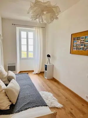 Coin salon dans l'établissement Village centre appartement