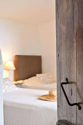 Un ou plusieurs lits dans un hébergement de l'établissement Holiday Home Domaine Punta della Guardia Maison A Figa mit Blick auf das Meer by Interhome
